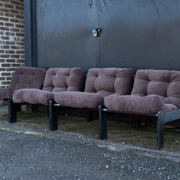 Four Brown 1970s lounge chairs