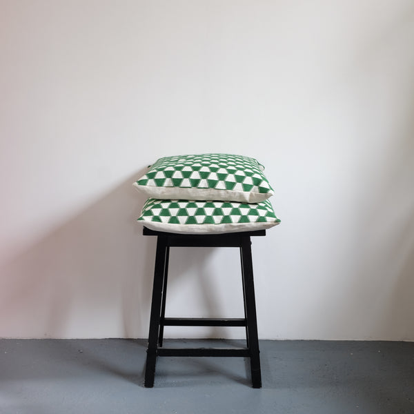 Two Green Geometric Cushions